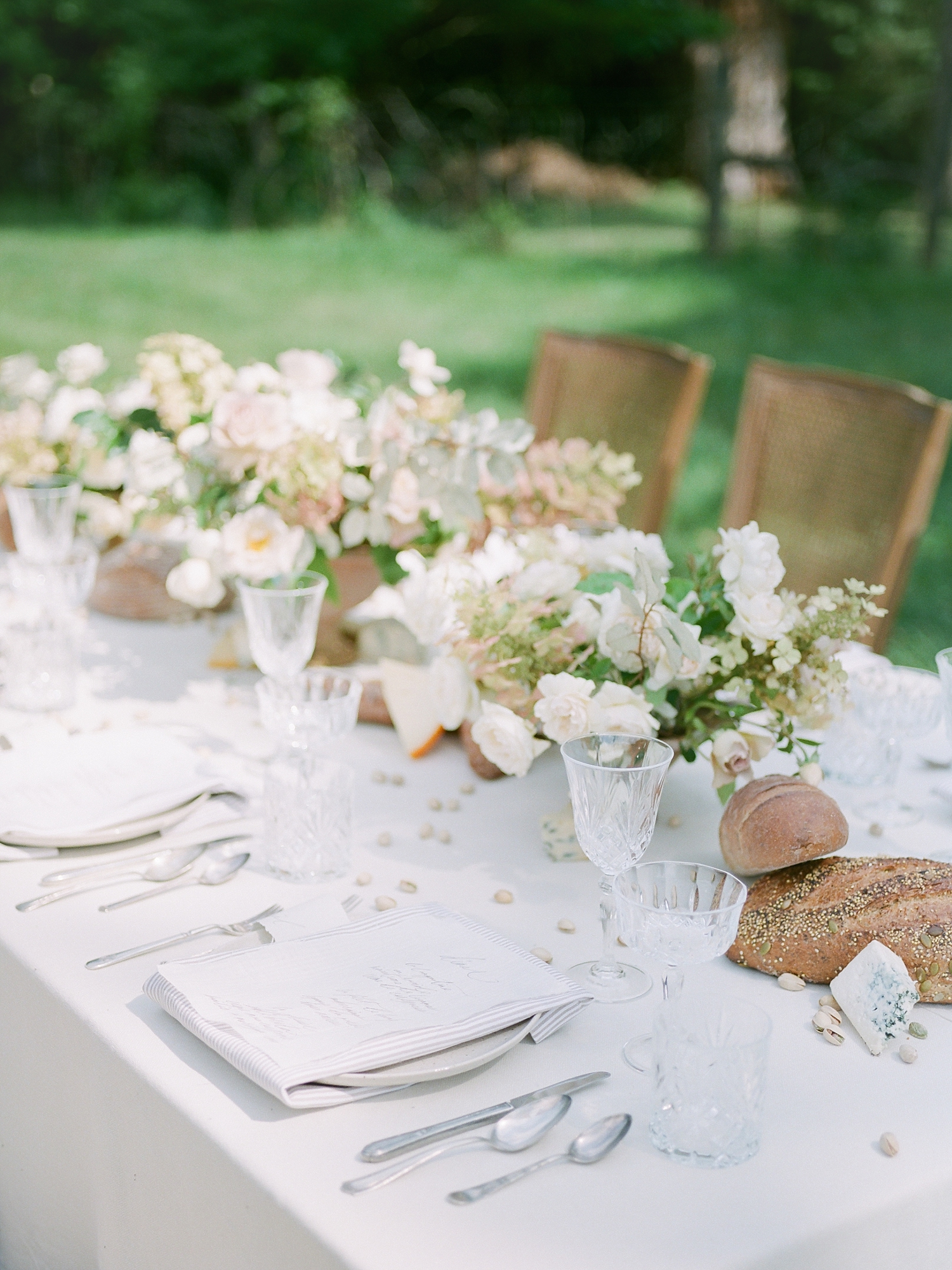 Our table design embraced the tradition of southern hospitality and grace with its overflowing assortment of breads, cheeses and settings fit for a luxurious and hearty celebration. (Who knew that being an adult would mean daydreaming about tablescapes - I am STILL swooning over this one!)