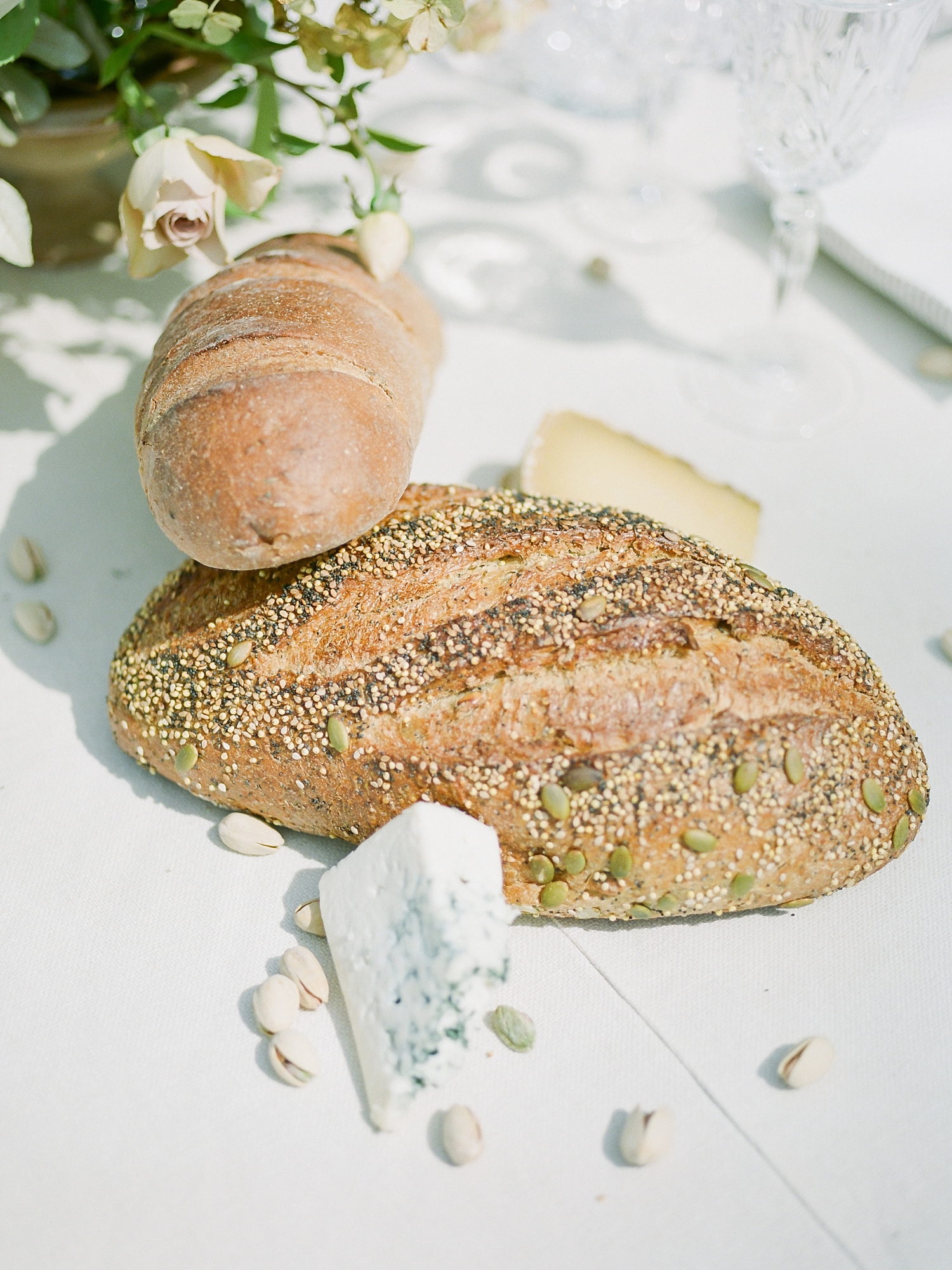 Our table design embraced the tradition of southern hospitality and grace with its overflowing assortment of breads, cheeses and settings fit for a luxurious and hearty celebration. (Who knew that being an adult would mean daydreaming about tablescapes - I am STILL swooning over this one!)