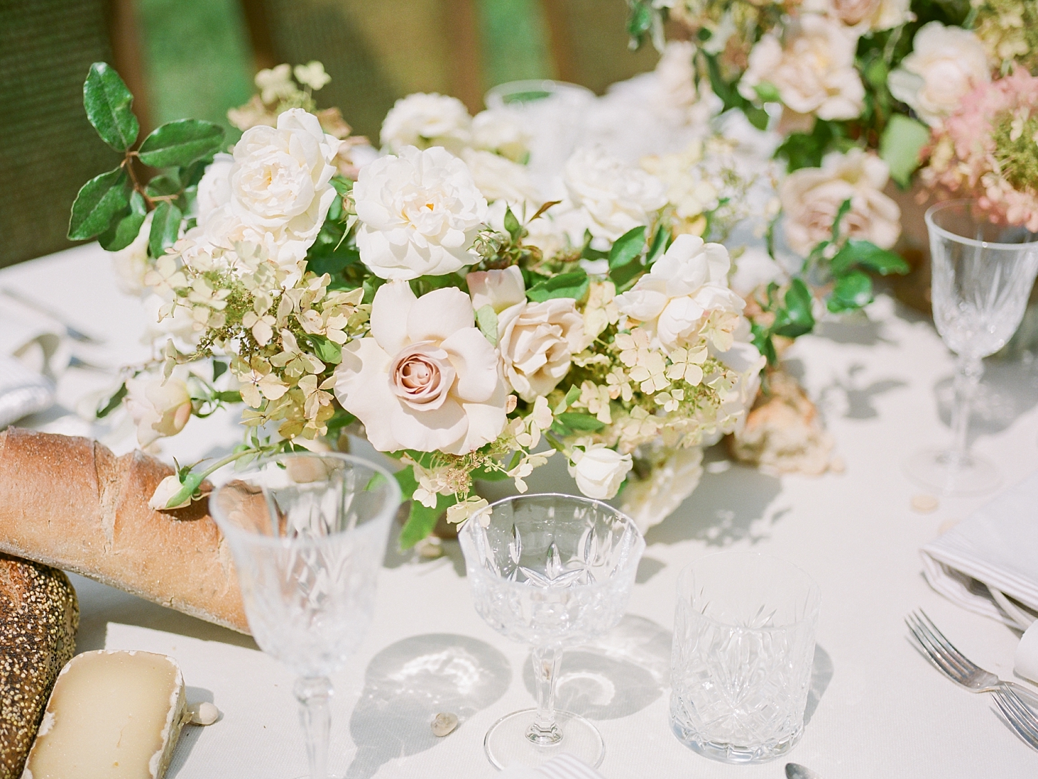 Our table design embraced the tradition of southern hospitality and grace with its overflowing assortment of breads, cheeses and settings fit for a luxurious and hearty celebration. (Who knew that being an adult would mean daydreaming about tablescapes - I am STILL swooning over this one!)